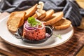 Beef tartare with red onion toast bread and garlic Royalty Free Stock Photo