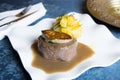 Beef tenderloin with grilled foie gras and sauce. Royalty Free Stock Photo