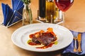 Beef tenderloin medallions with sauce and onion Royalty Free Stock Photo