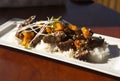 Beef teriyaki over rice with fresh bean sprouts as garnish Royalty Free Stock Photo