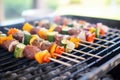 beef teriyaki and vegetable kabobs on a charcoal grill Royalty Free Stock Photo