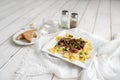 Beef tips over bow tie pasta and Alfredo sauce Royalty Free Stock Photo