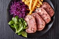 Beef tongue aspic with coleslaw and french fries Royalty Free Stock Photo