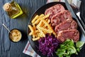 Beef tongue aspic with coleslaw and french fries Royalty Free Stock Photo