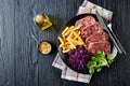 Beef tongue and meat aspic with french fries Royalty Free Stock Photo