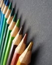 Beeing creative! Colorful pencils with over black background.
