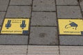 Beek, South Limburg / Netherlands. July 27, 2020. Yellow signs on the floor: social distance and mandatory use of the mask