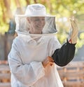 Beekeeper woman, smile and safety at farm with apiculture suit, vision or happy in summer harvesting time. Bee expert