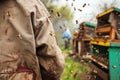 beekeepers jacket near beehives, bees flying around