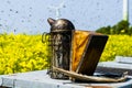 Beekeepers smoker on a beehive Royalty Free Stock Photo
