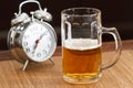 Beer and alarm clock Royalty Free Stock Photo