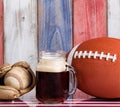 Beer and American sports objects with faded wooden boards painted in national colors Royalty Free Stock Photo