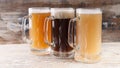Beer. Assortment beer glasses on the wooden table Royalty Free Stock Photo