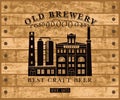 Beer banner with old brewery on wooden background Royalty Free Stock Photo