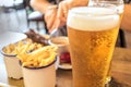 Beer with barbecue food at restaurant. Royalty Free Stock Photo