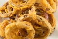 Beer battered onion rings close up