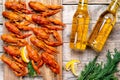 beer and beautiful boiled crayfish on a wooden table and wooden board with dill and lemon Royalty Free Stock Photo