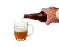 Beer being poured from bottle Royalty Free Stock Photo