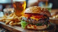 beer being poured into glass with gourmet hamburgers Royalty Free Stock Photo