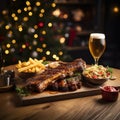 Beer being poured into glass with gourmet steak and french fries on christmas background Royalty Free Stock Photo