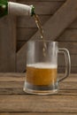 Beer being poured into a mug Royalty Free Stock Photo