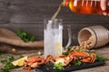 Beer and boiled crabs on a wooden background Royalty Free Stock Photo