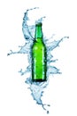 Beer bottle being poured in a water Royalty Free Stock Photo