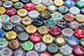 beer bottle caps background, mix of different world brands Royalty Free Stock Photo