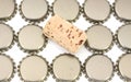 Beer bottle caps plus wine cork Royalty Free Stock Photo