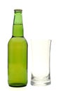 Beer bottle and empty glass Royalty Free Stock Photo