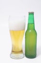 Beer bottle and pint glass Royalty Free Stock Photo