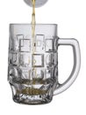 Beer from a bottle is poured in an empty mug. Isolated on a white background Royalty Free Stock Photo