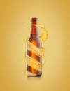 Beer bottle with water drops and spiral splash around bottle. Royalty Free Stock Photo