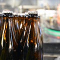 beer bottles on the assembly line in a modern brewery - industrial plant in the food industry Royalty Free Stock Photo