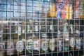 Beer bottles and soft drink cans in kiosk window