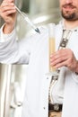 Beer brewer in his brewery examining Royalty Free Stock Photo