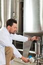 Beer brewer in his brewery Royalty Free Stock Photo