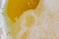 Beer bubbles close up of mug beer glass top view Royalty Free Stock Photo