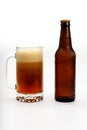 Beer Bubbling in Mug and Bottle Royalty Free Stock Photo