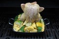 Beer chicken on the grill with veggies