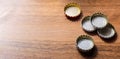 Beer caps on wooden background Royalty Free Stock Photo