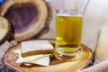 Beer in glass mug eaten with cheese and bread were placed on wooden plates as a background. Royalty Free Stock Photo