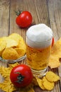 Beer, chips and tomatoes