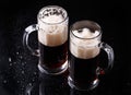 Beer on empty black table Royalty Free Stock Photo