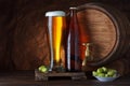 Beer glass with barrel and fresh hops