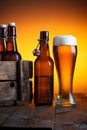 Beer glass and beer crate with bottles Royalty Free Stock Photo