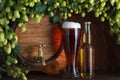 Beer glass and bottle with vintage beer barrel