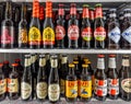 Beer in glass bottles of various types and brands Royalty Free Stock Photo