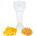 Beer glass with chips and peanuts Royalty Free Stock Photo