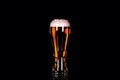 Beer glass with foam on black background Royalty Free Stock Photo